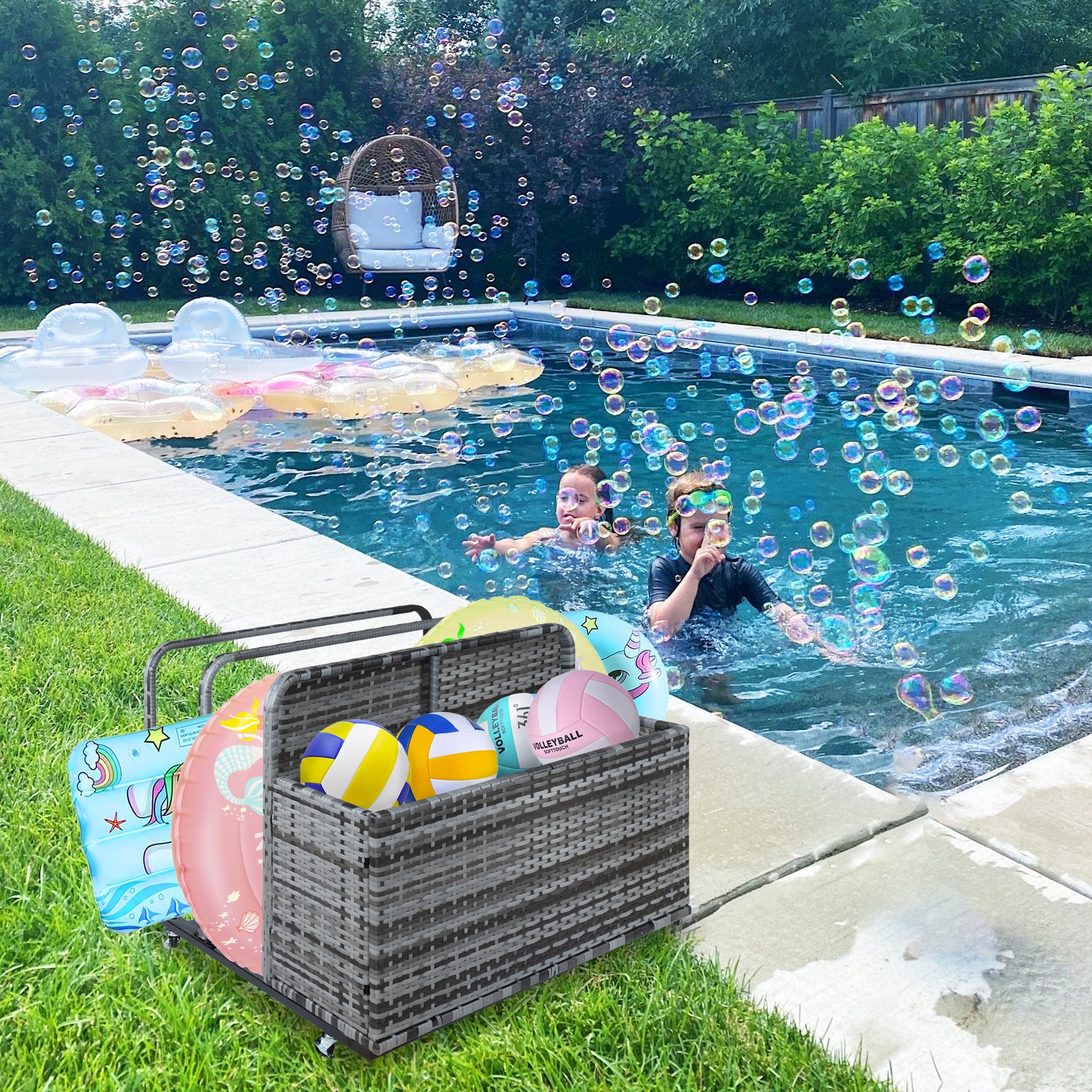 A scenic view of a swimming pool with a scenic ocean view and surrounding outdoor furniture, with a wicker storage box filled with pool toys in the foreground.