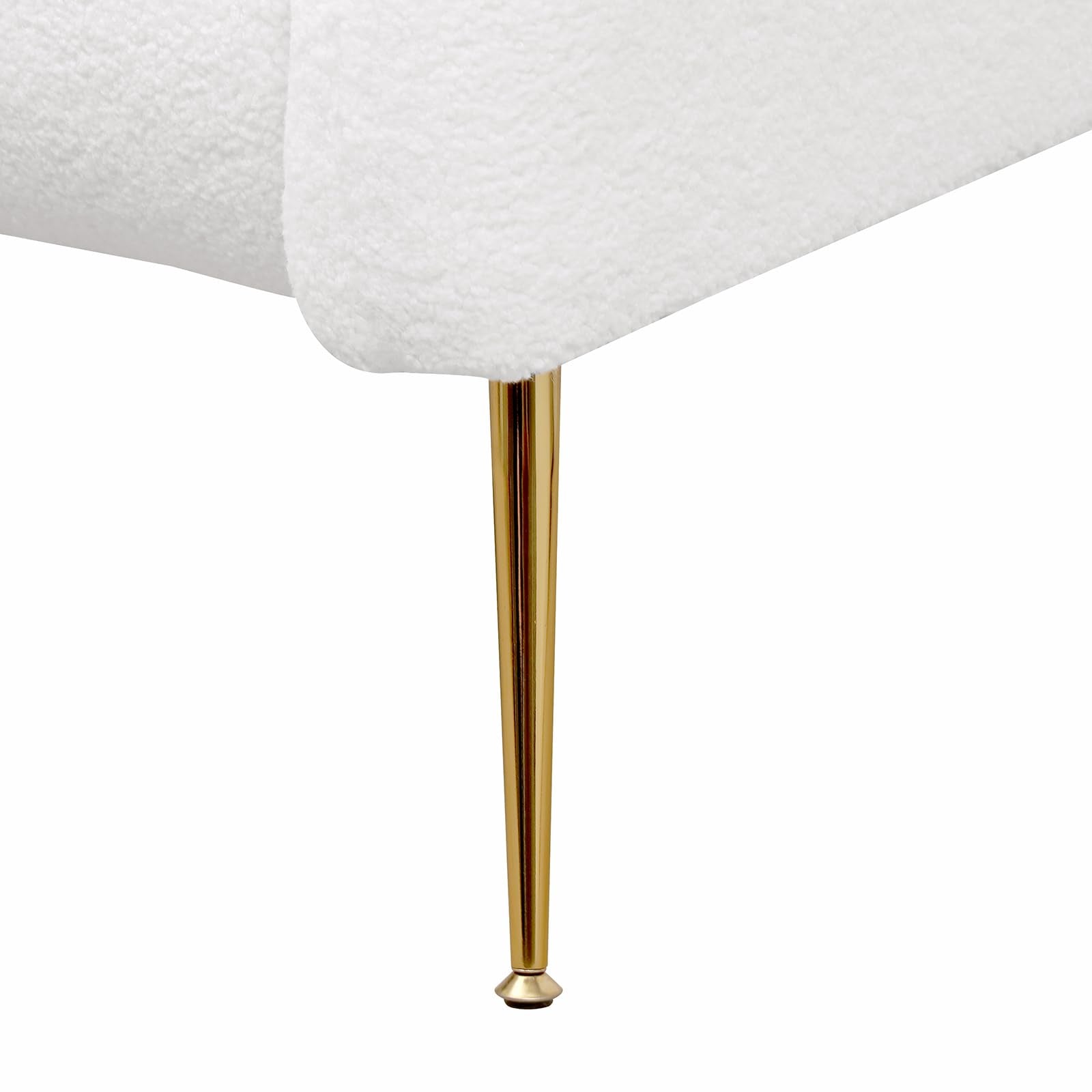 Close-up of the white textured fabric upholstery of the armchair, showing a soft, boucle-like material.
