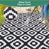 Garvee Outdoor Black & White 6x9 reversible plastic straw rug, washable, waterproof, Perfect for patio, porch, picnic, camping, RV, beach, trailer