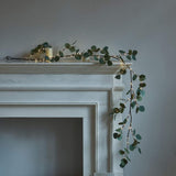 Garvee Guirnalda artificial iluminada, luces artificiales de 6 pies con ramas flexibles, guirnalda de vegetación iluminada con pilas para decoración de chimenea, primavera, Navidad, día festivo