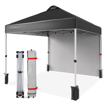 10'x10' black pop-up patio tent with sidewall, waterproof, UV protection, includes wheeled bag and sandbags.