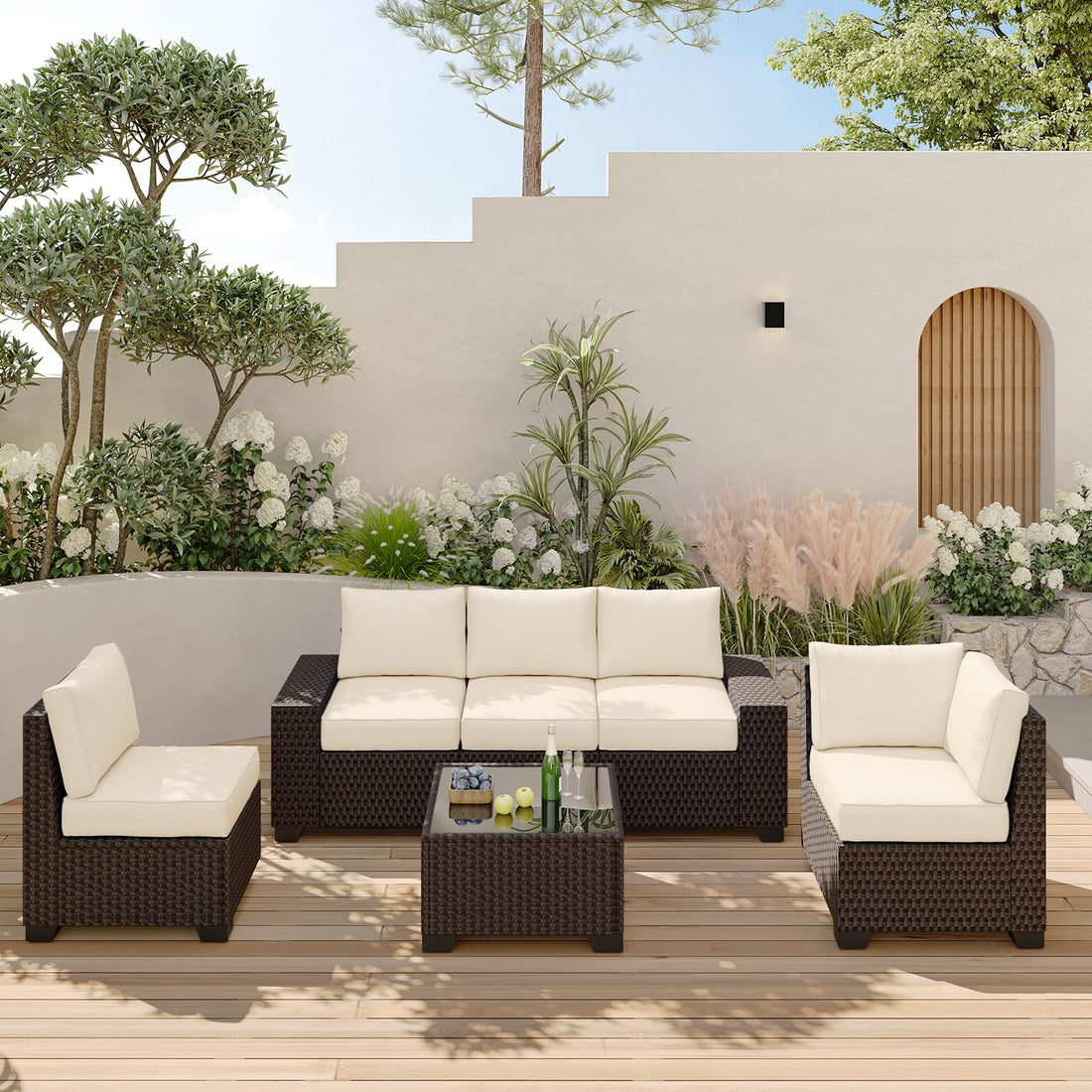 Outdoor sectional sofa set, weather-resistant wicker for garden or backyard use.