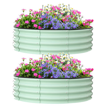 Green raised garden beds, 4ft diameter, durable steel, ideal for outdoor planting.