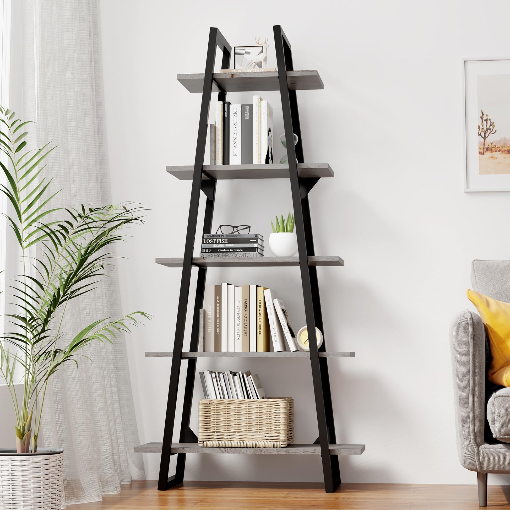 A black metal and gray wood ladder bookshelf with five shelves, in a living room setting.