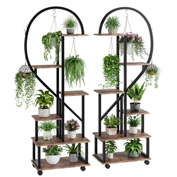 Elegant plant rack with storage shelves and hanging hooks, perfect for flowers and greenery.