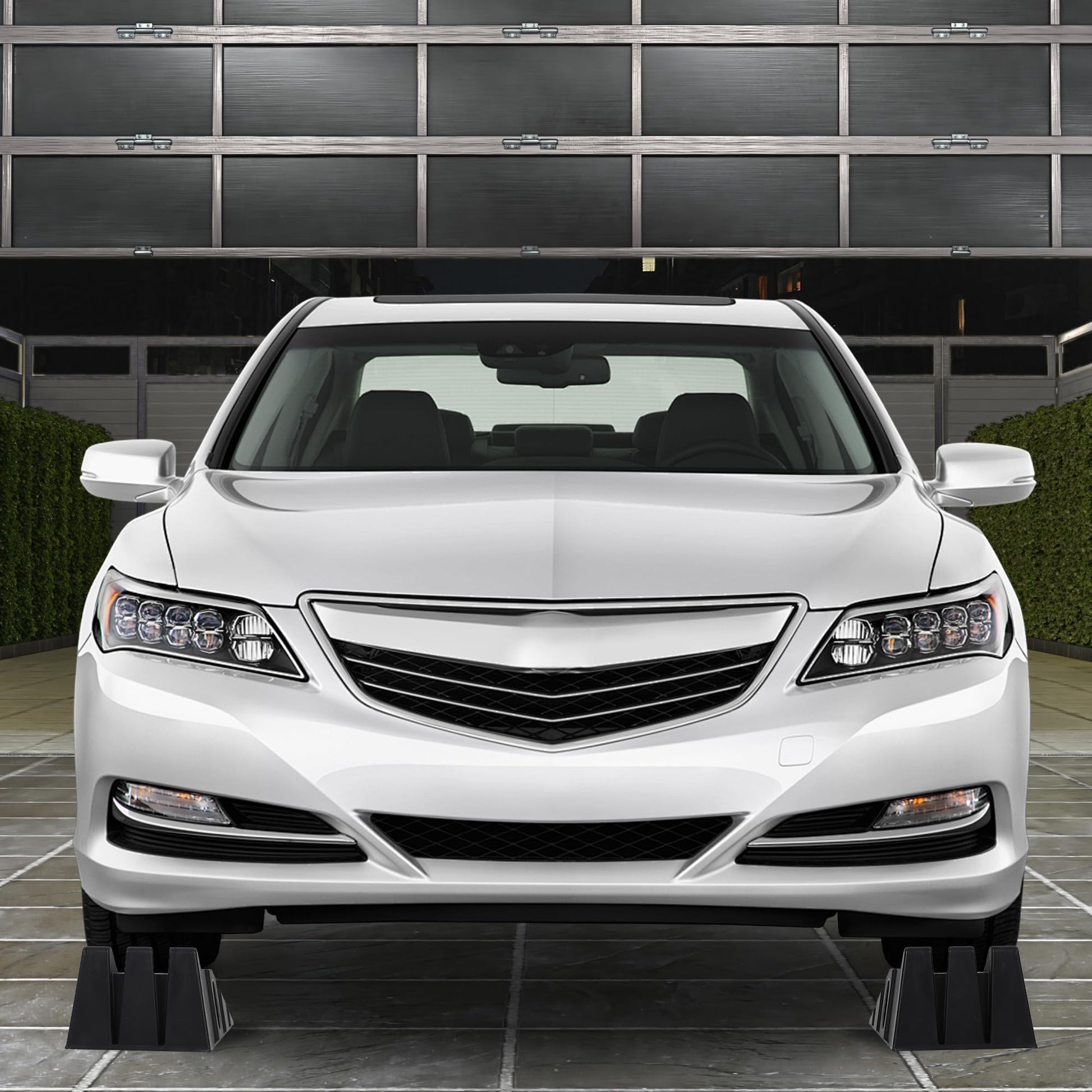 GARVEE heavy-duty car ramps positioned under a car for garage oil changes and maintenance