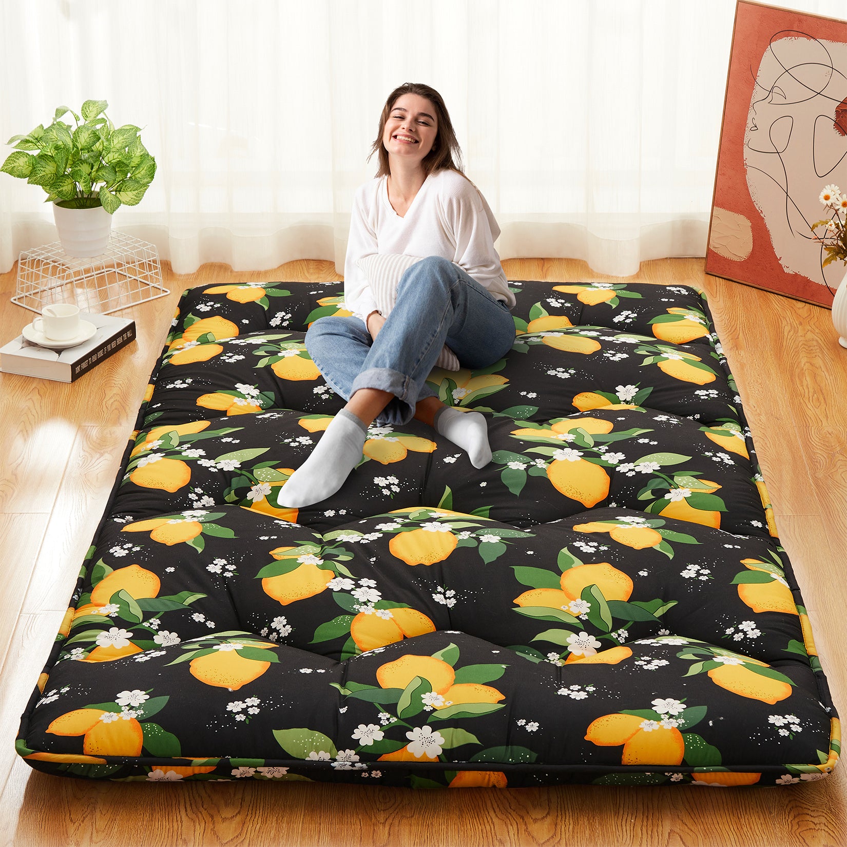 Dimensions of the black futon mattress showing 54 inches width and 80 inches length, suitable for full size.