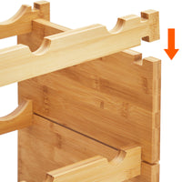 close-up of wine bottle storage rack made of wood
