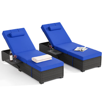 Outdoor reclining chaise lounge chairs with side snack table, perfect for poolside. 