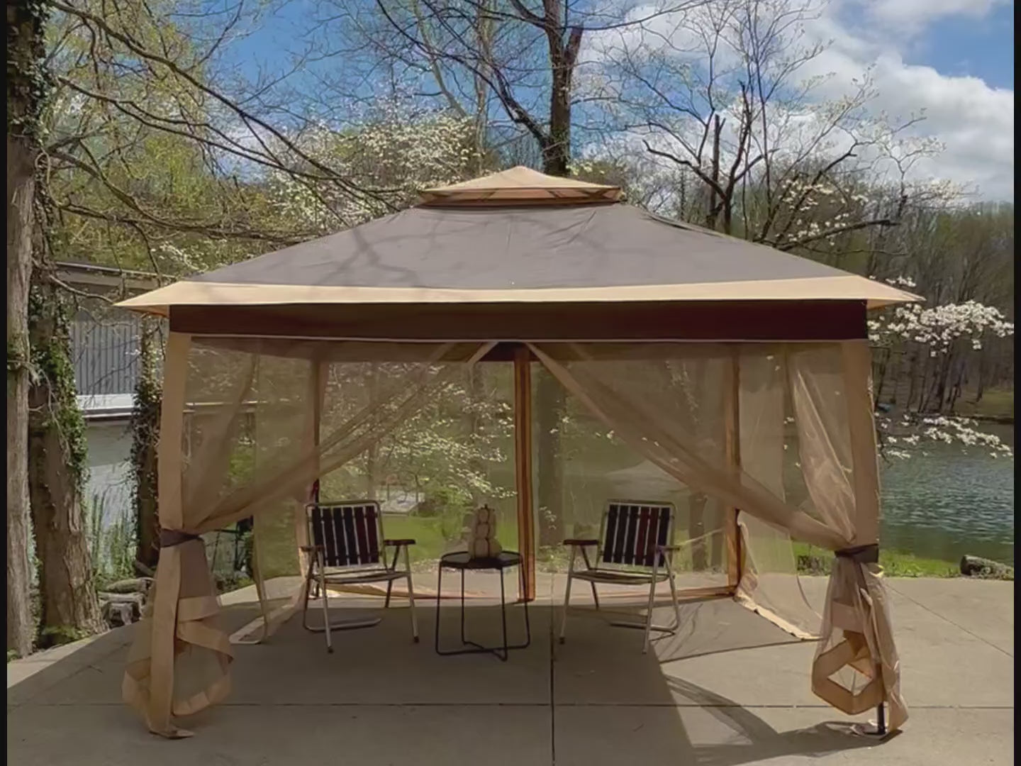 Khaki outdoor canopy shelter with full mesh sidewalls and zippered openings