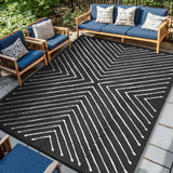 Garvee 6' x 9' Reversible Waterproof Outdoor Rug – Modern Striped Patio Carpet, Easy to Clean, collapsible, UV Protected, Large 6x9ft Plastic Straw Mat for RV, Camping, Picnic - Striped|Black & White